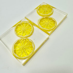 Clear resin w 3d lemon fruit slice coaster set. Great gift for lemon collectors. Bright and cheerful minimal home decor. Coffee, tea lover
